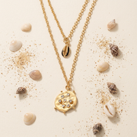 Pendentif Coquillage Cauri Tribal